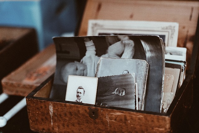 Image of a wooden box containing old photographs