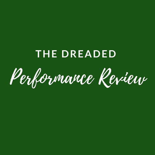Green background with the words: The Dreaded Performance Review in white