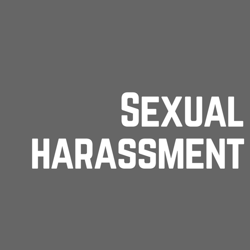Gray background with the words in all caps: Sexual Harassment