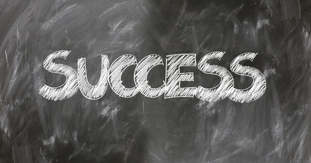 Chalkboard with the word Success in large letters written on it