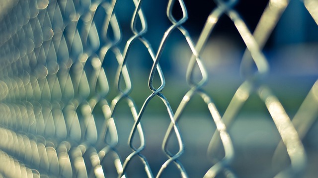 Image of a chain-link fence from a tight angle