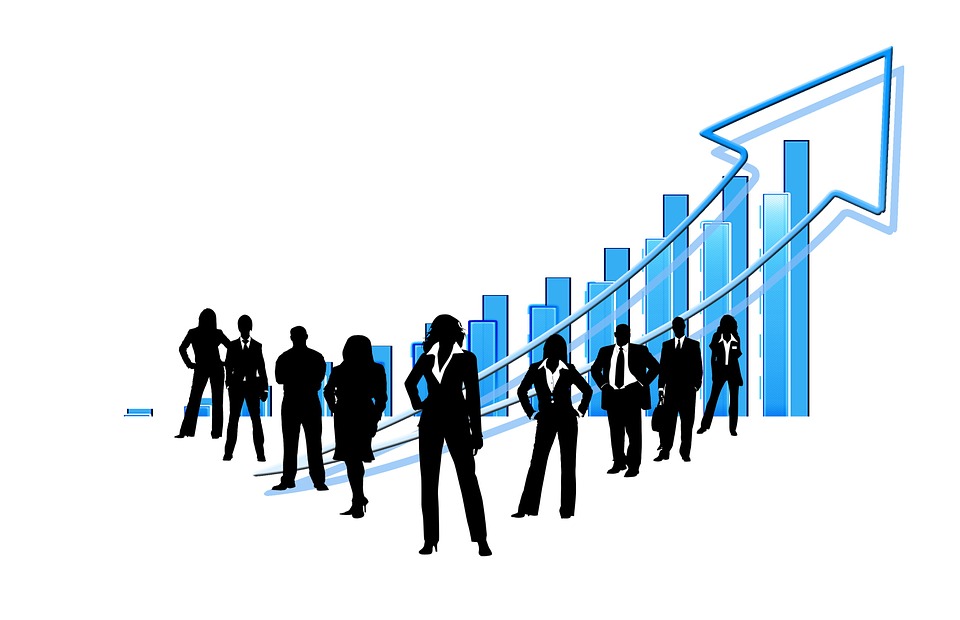 Graphic image of men and women in suits with a positive trajectory and arrow behind them signaling success and job growth
