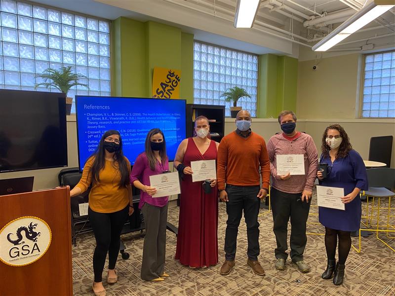 Group of student presenters in masks