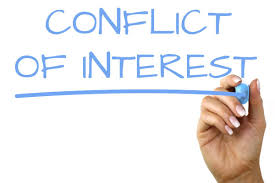 Conflict of Interest written on a screen