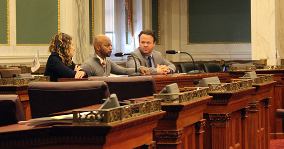 Kevin Thomas and two others presenting in City Counsel chambers