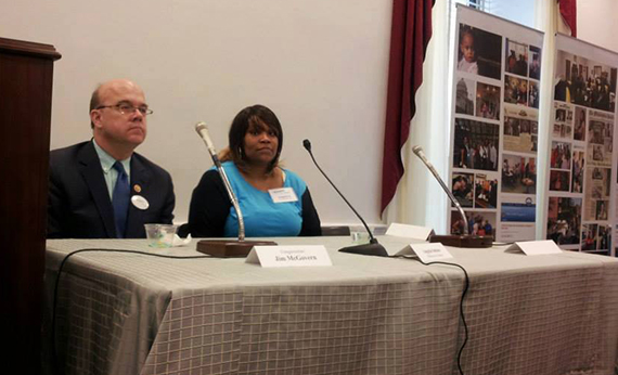 Witnesses member Nike sitting on a panel discussion with Congressman Jim McGovern