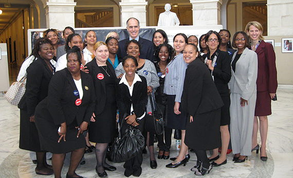 Members of Witnesses to Hunger posing with Senator Bob Casey in the Capitol rotunda