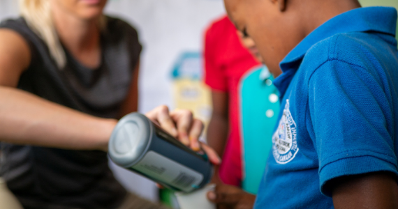 kid getting soda served