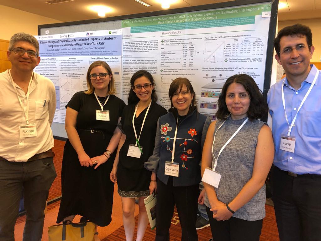 salurbal-team-members-in-front-of-poster-at-conference