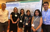 salurbal-team-members-in-front-of-poster-at-conference