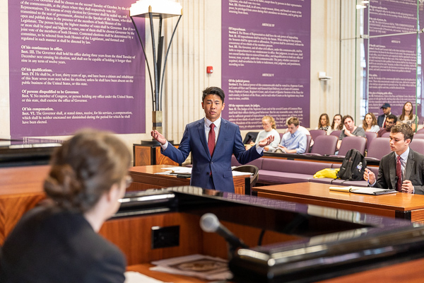 Jonathan Kuang of UCLA addresses a witness during the final.