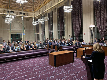 Professor Gwen Roseman Stern greets competitors at Tournament of Champions 2018