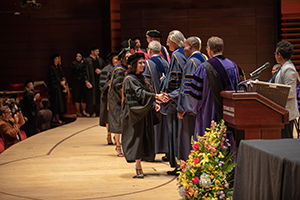 Grads receive diplomas