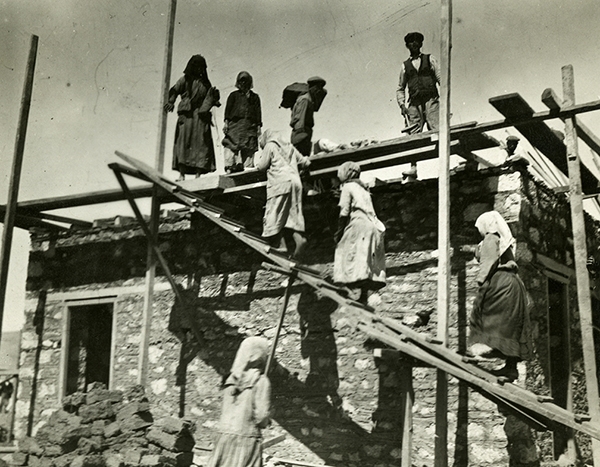 Solinica refugees assisting with building construction. (The Legacy Center Archives and Special Collections)