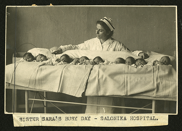 Salonika Hospital showing Nurse Sara with infants. (The Legacy Center Archives and Special Collections)