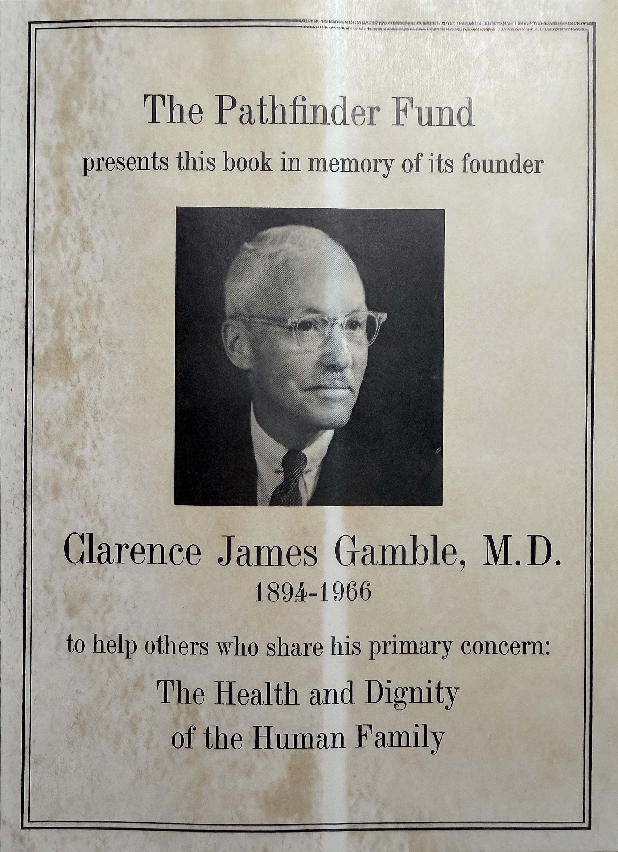 Cover of memory book dedicated to Clarence Gamble, founder of the Pathfinder Fund (The Legacy Center Archives and Special Collections)