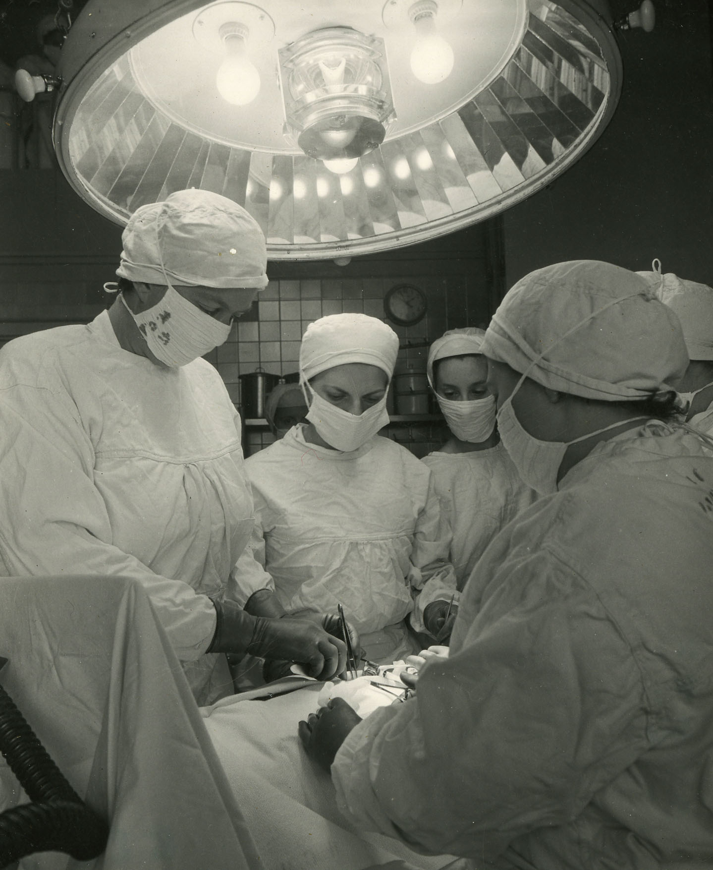 Photograph of Dr. Mary DeWitt Pettit operating in 1949