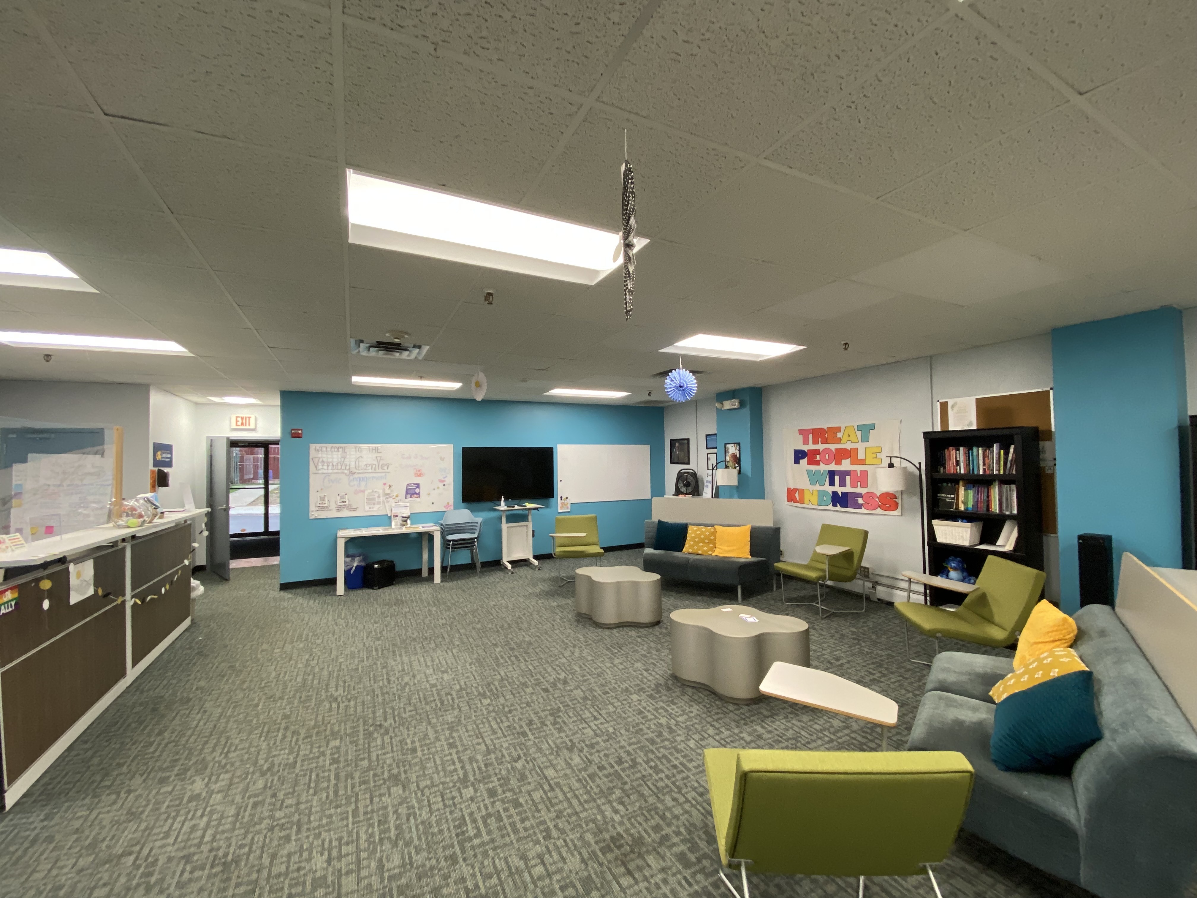 Lending Library interior with comfortable chairs and couches for reading