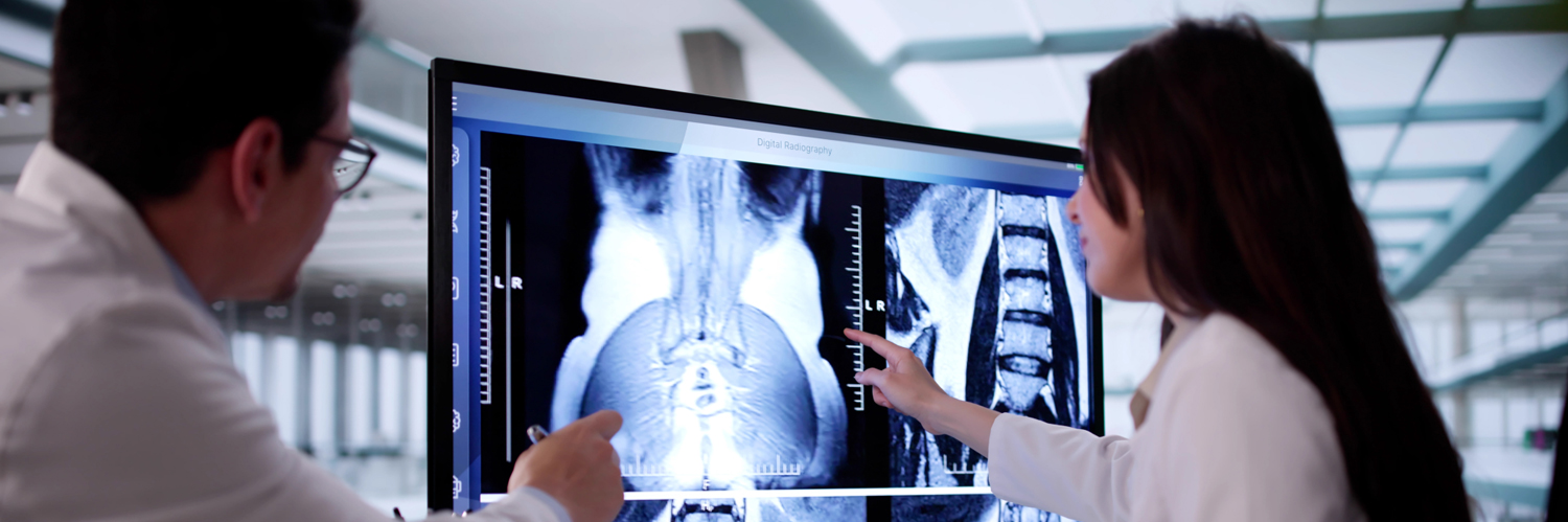 Medical providers looking at radiology images