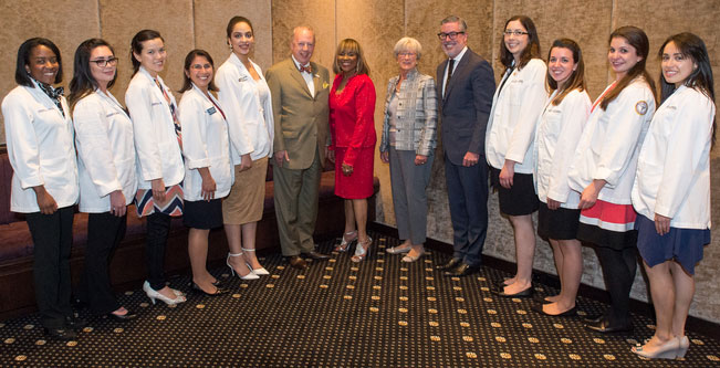The current Woman One Scholars with College of Medicine Dean Daniel Schidlow, Woman One Honoree Renee Amoore, Institute Director Lynn Yeakel, and Drexel University President John Fry