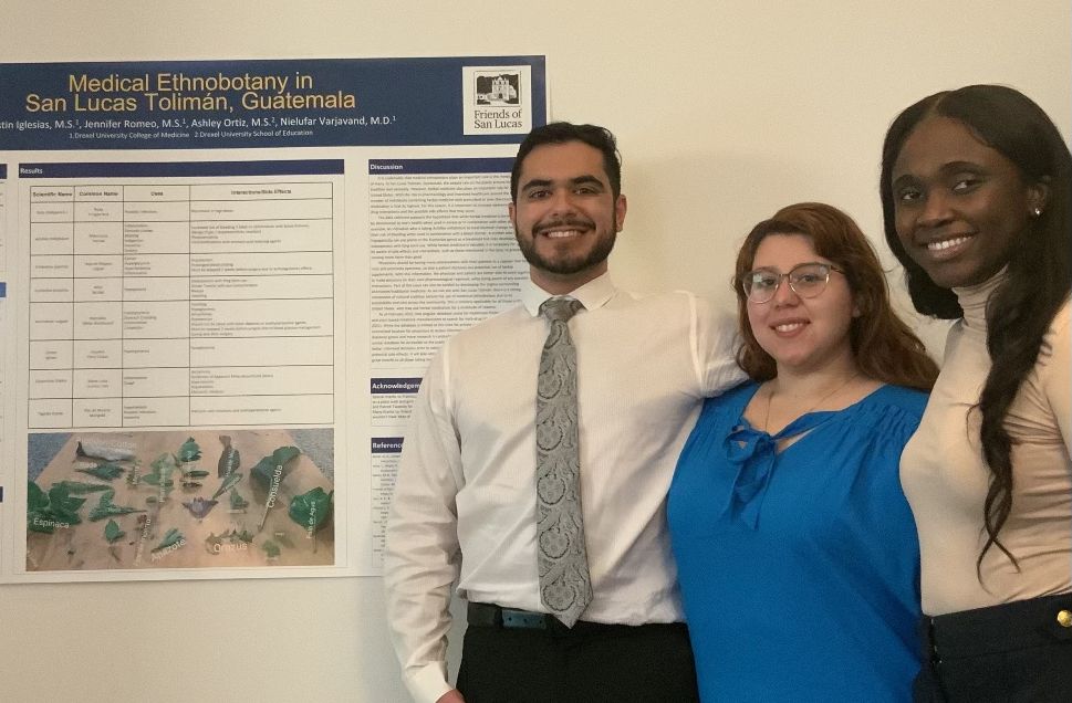 Global Health Students Austin Iglesias, Jennifer Romeo, and Ashley Ortiz at Discovery Day 2022