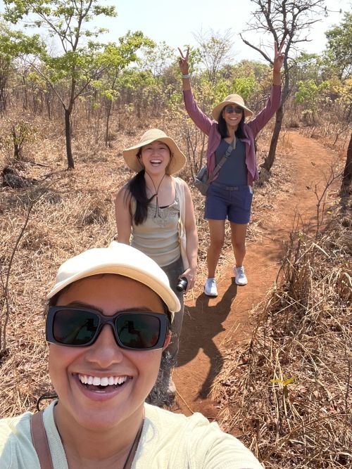 Medical student Samhita Nanduri with others in the bush during a global health experience in Lusaka, Zambia
