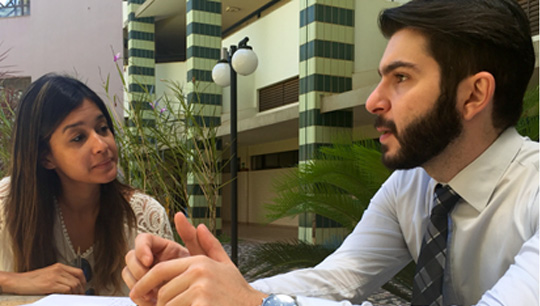 Dr. Gibran Daher being interviewed by journalist Juliana Titto in Brasilia for Dr. Daher's upcoming book publication.
