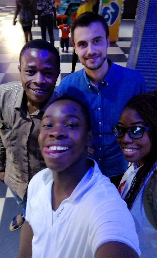 Drexel medical student Alexander Sloboda at the movies with friends while on his elective in Nigeria.