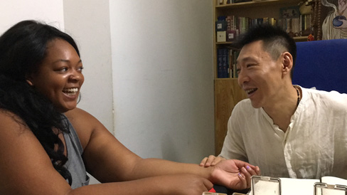 Drexel MD student Chalon Forbes at a local traditional Chinese medicine clinic with a doctor, using traditional techniques to check my health status.