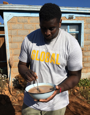 Drexel medical student Theophilus Abah in Zambia/Zimbabwe with Dornsife Global Development Scholars Program and World Vision.