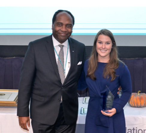 Dr. Spruance receives the NIDDK Innovation Award from Institute Director Dr. Griffin Rodgers.