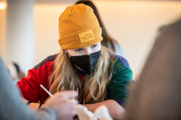 A student wearing a mask attending the Dispassionate Observation event