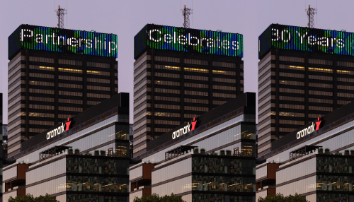 The lights on the PECO building saying 'Partnership Celebrates 30 Years'