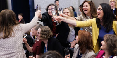 ELAM and ELH graduates toasting each other at the 2024 Leaders Forum