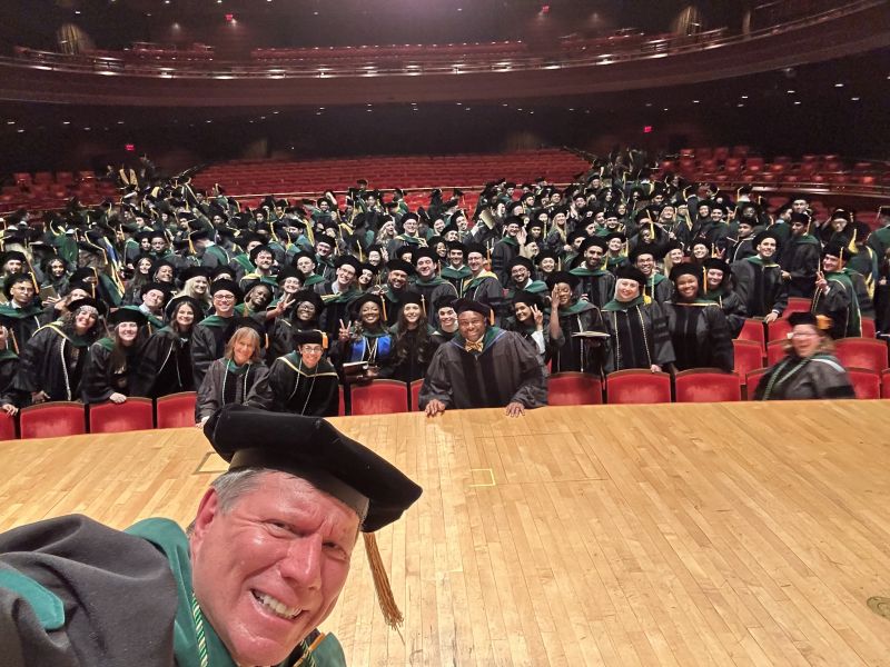 Dean Cairns in a selfie at Commencement