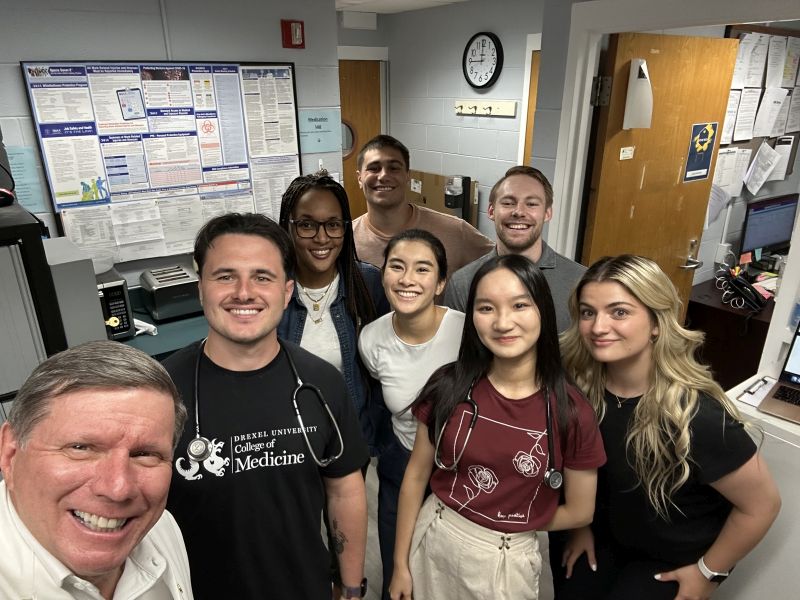 Dean Cairns in a selfie with Drexel students