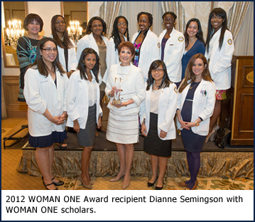 2012 Woman One Award recipient Dianne Semingson with Woman One scholars