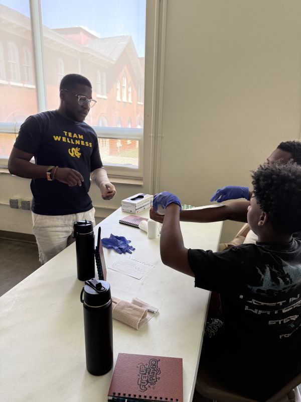 Solomon Wekunga at a community service event
