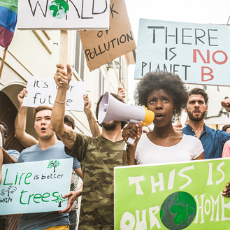 Crowd demonstrating against global warming and plastic pollution, concepts about green ecology and environmental sustainability.