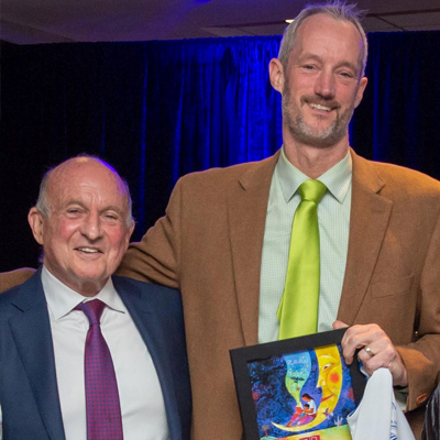 Richard Robinson, chief executive of Scholastic, was on hand when Dr. Kersten accepted the national Richard Robinson Award from Reach Out and Read.