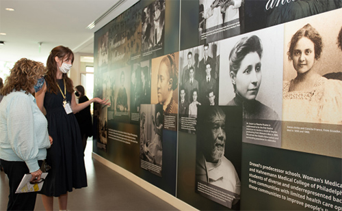 The mural wall highlighting Drexel’s rich history, with materials from the Legacy Center Archives and Special Collections.