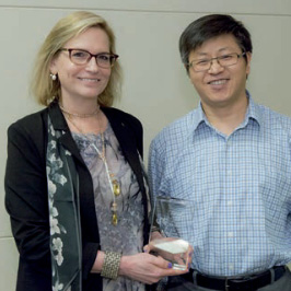 Nancy Spector, MD, associate dean for faculty development, with awardee Wen-Jun Gao, MD, PhD