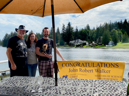 Parents Rob Walker and Jamie Walker joined their son John Walker, MS '’20, for graduation.