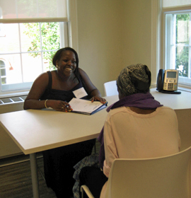 Law students meet with community members during client in-take sessions.