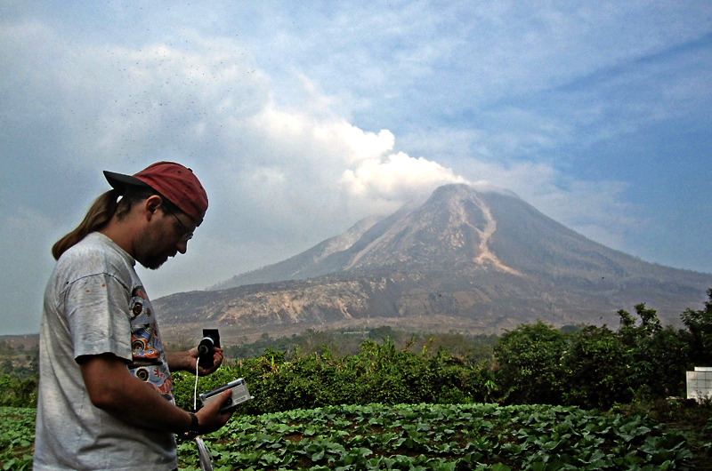 Loÿc Vanderkluysen, PhD, monitors the active volcano Sinabung in Indonesia.