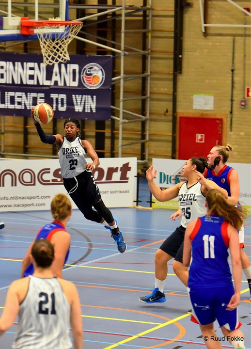 Drexel's Alexis Smith driving to the basket against Binnenland Rotterdam. Photo courtesy of Ruud Fokke.