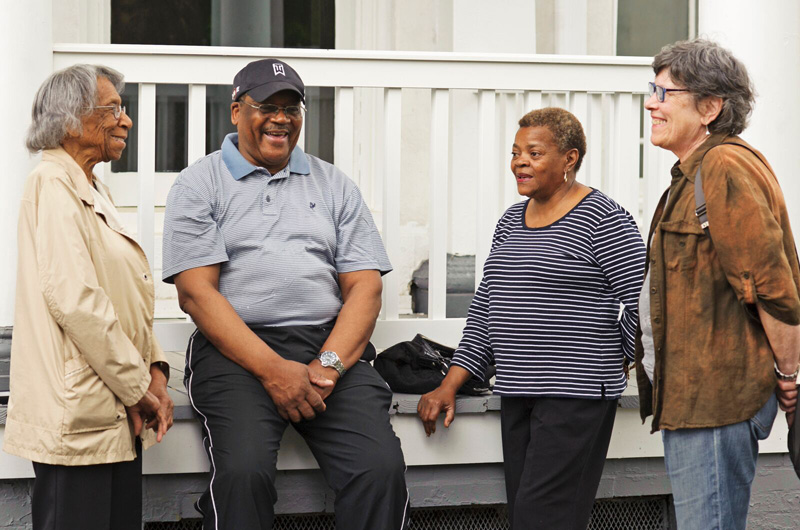 Members of the neighborhoods around the Dornsife Center, from left to right, Cora Conyers, Bishop Claude Barnes, Mae Barnes, and Helma Weeks. Photo by Jennifer Britton.