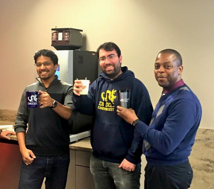 Engineering PhD students James and Cem enjoy the first cups of coffee in the suite with Director of Graduate Student Organizations Michael Ryan.