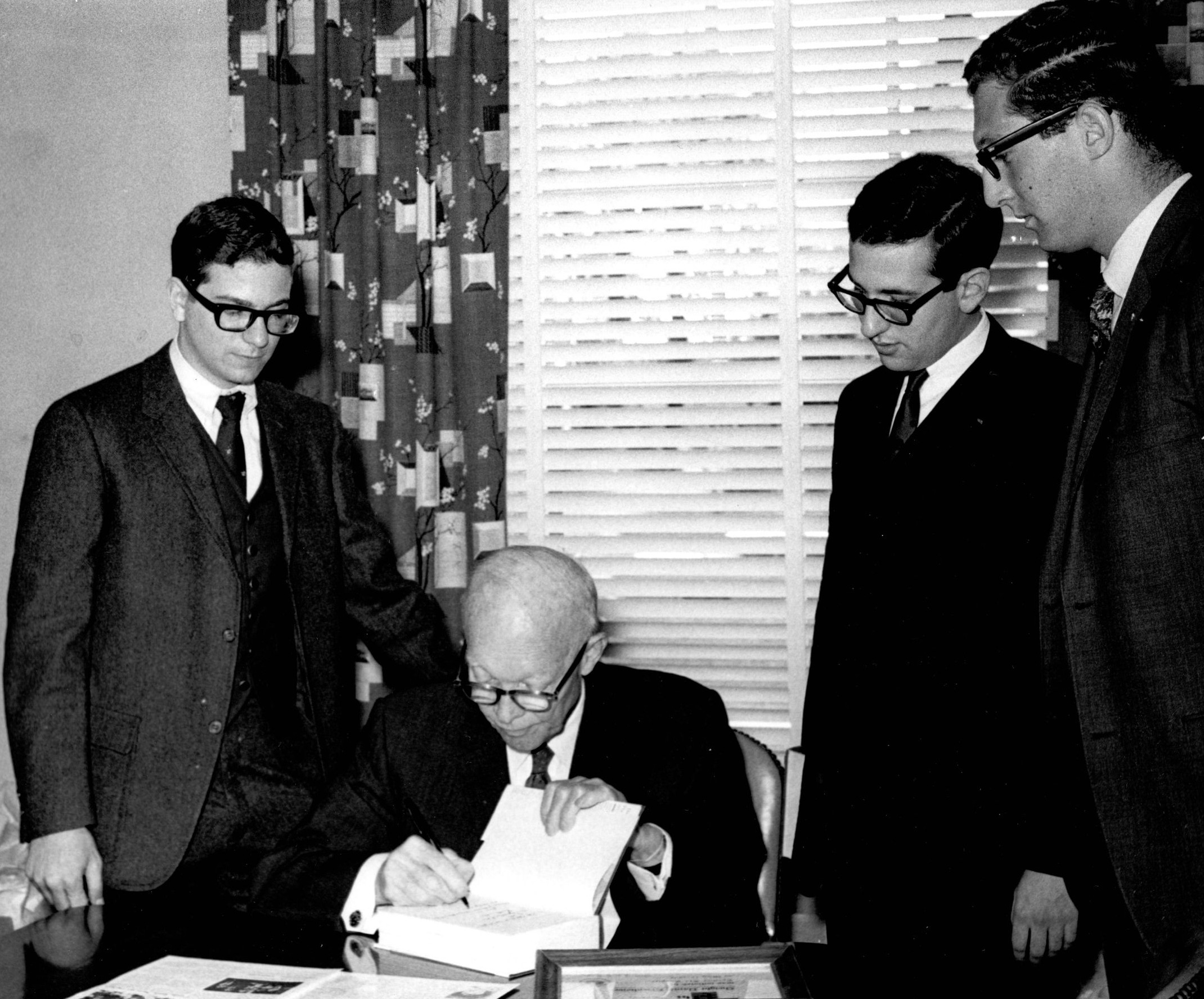  Dwight D. Eisenhower with Stan Abramson, Mike MarkowicH and Jeff Steinhorn while being presented Tau Epsilon Phi Distinguished American Award in 1967. Photo courtesy University Archives.