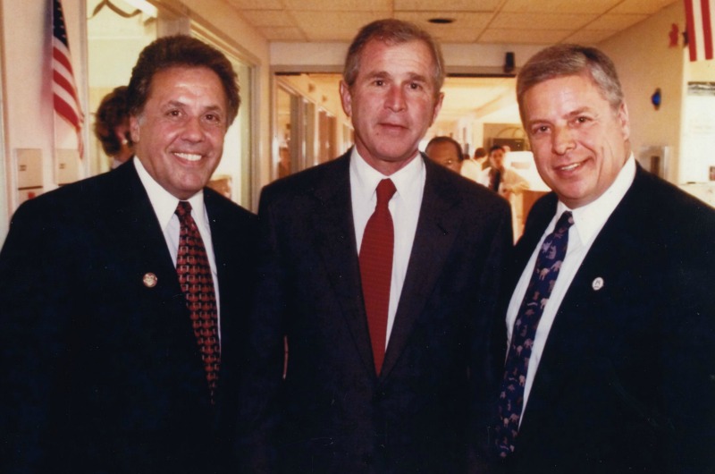 Left to right: Manuel N. Stamakis, then-chairman of MCPHU and a Drexel trustee, future President George W. Bush and Constantine Papadakis in 2000. Photo courtesy University Archives.